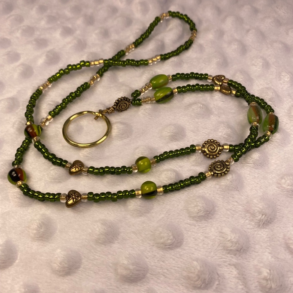 Green Glass Bead Lanyard with Metallic Heart and Swirl Sun Beads